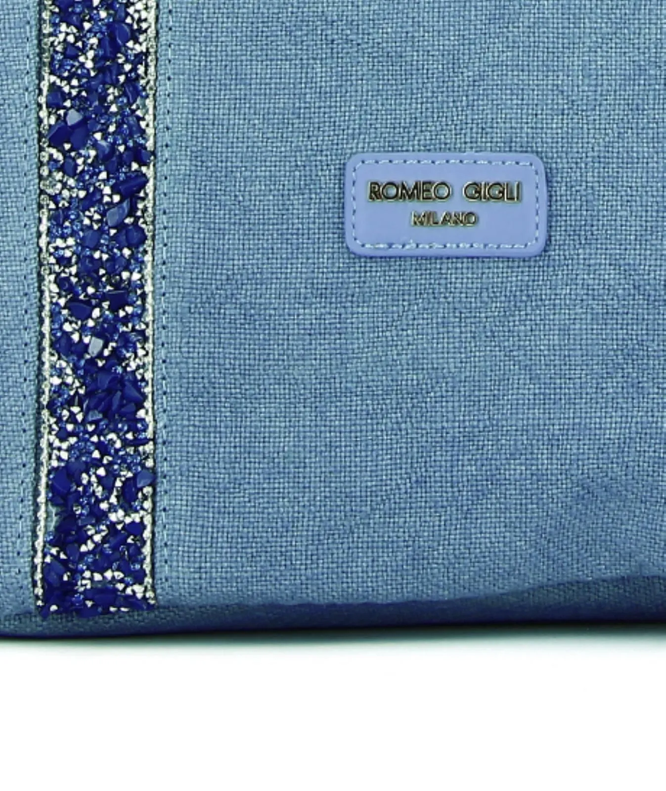 Shopper blu in tessuto con manici decorati